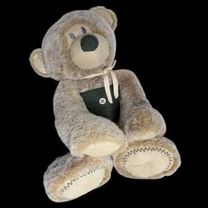 Demdaco Teddy Bear Frosted Beige Plush Green Pocket Magnetic Hands 12 in Sitting